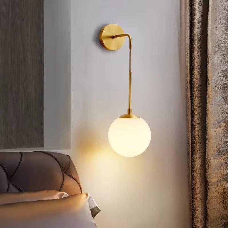 GOLDEN GLOBE WALL SCONCE